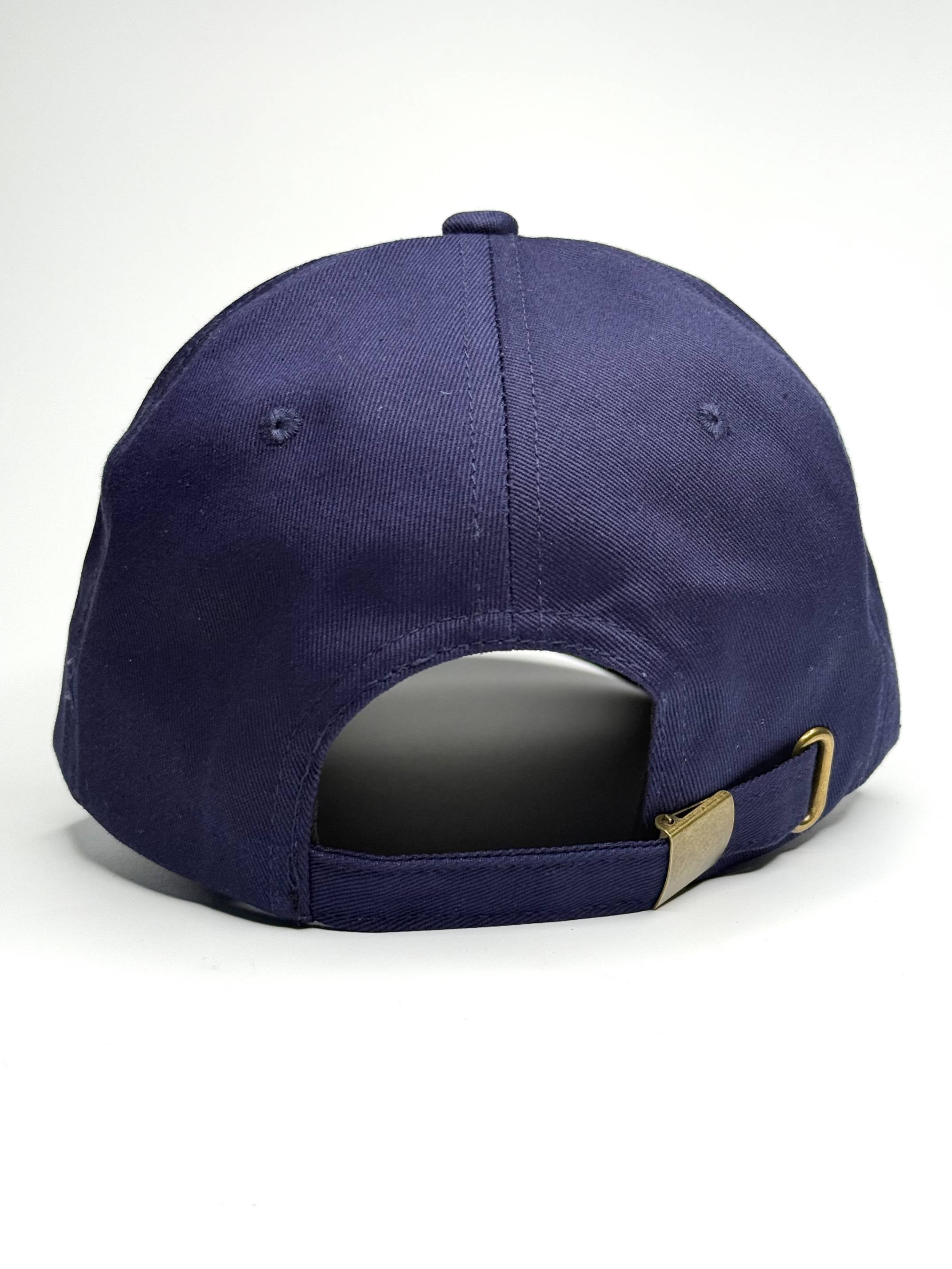 Navy blue baseball cap with a gold buckle on a white background