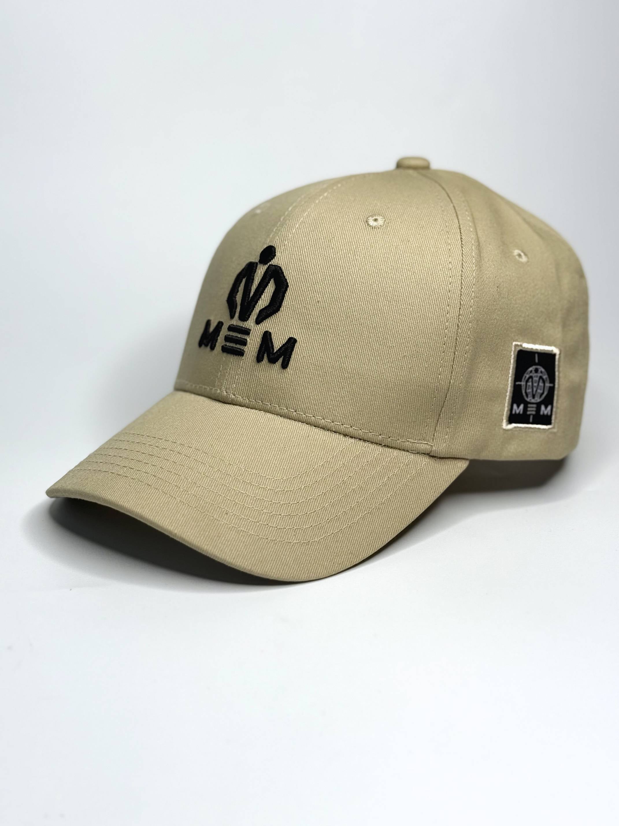 Beige cap with black logo and text on a white background