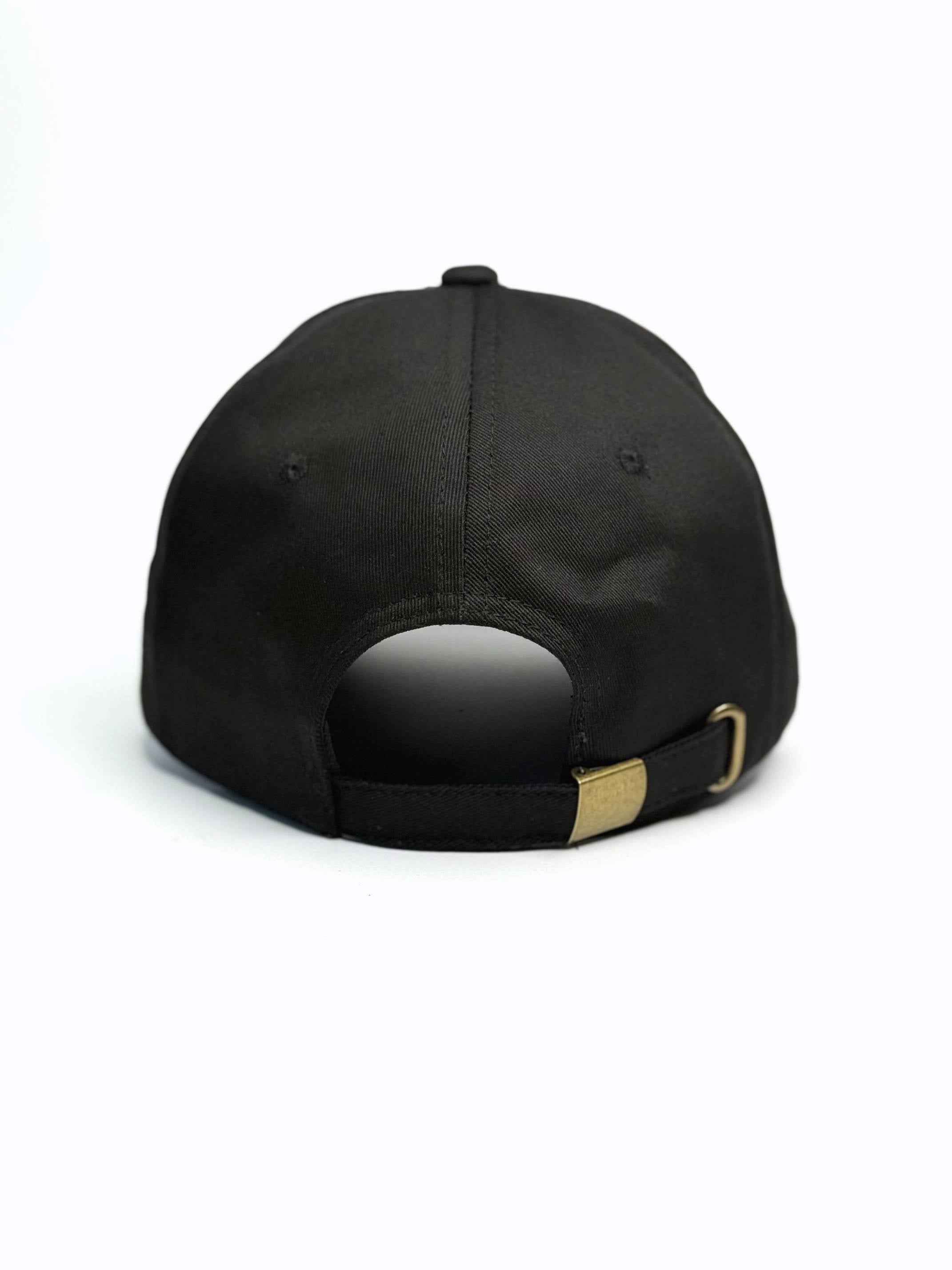 Black cap with a gold buckle on a white background