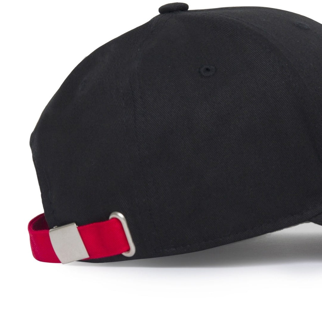 black baseball cap with red straps